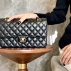CN Classic Medium Double Flap Black Caviar Bag